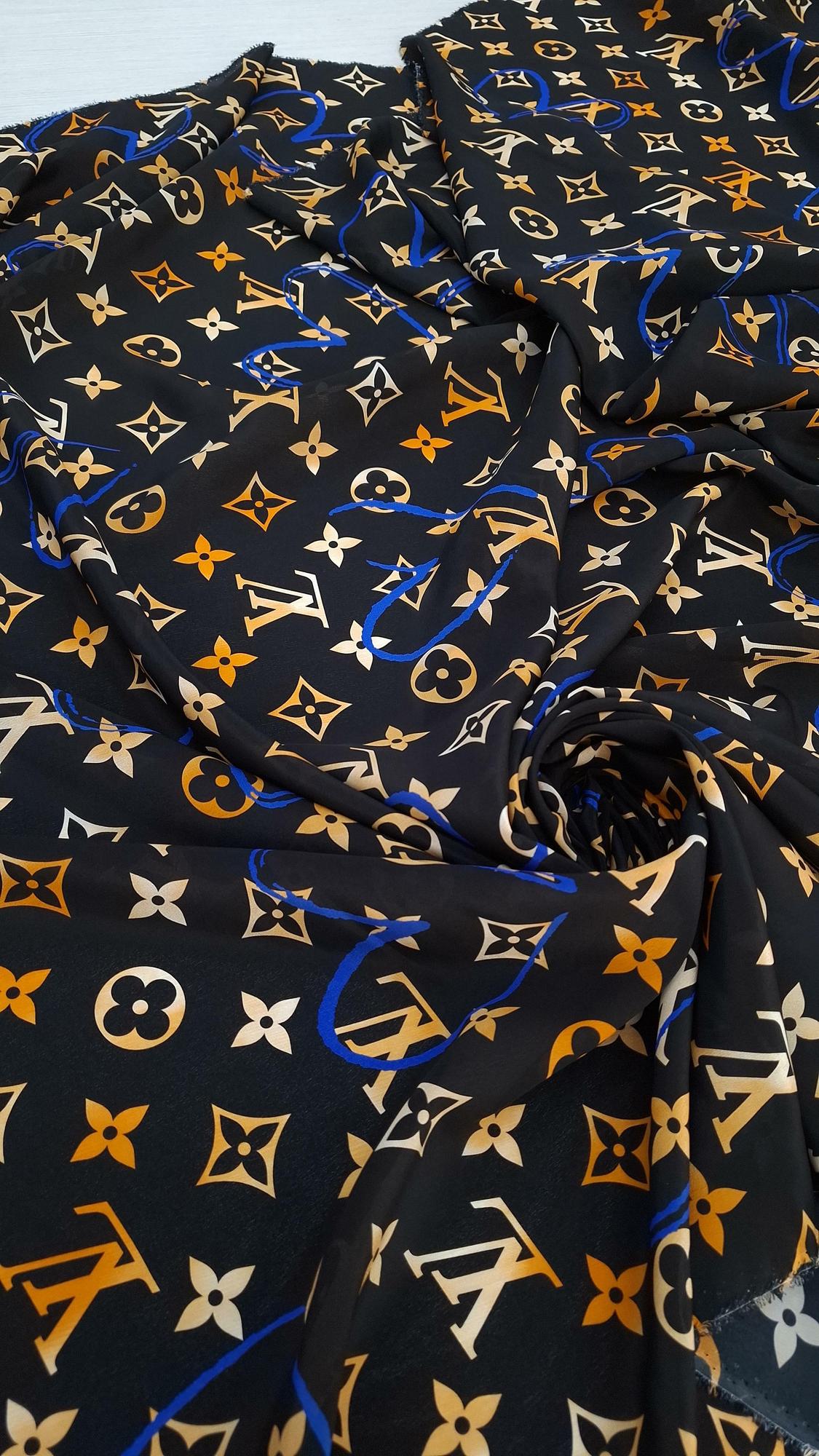 Шелковый крепдешин LV черный фон с оранжево-синим принтом из лого