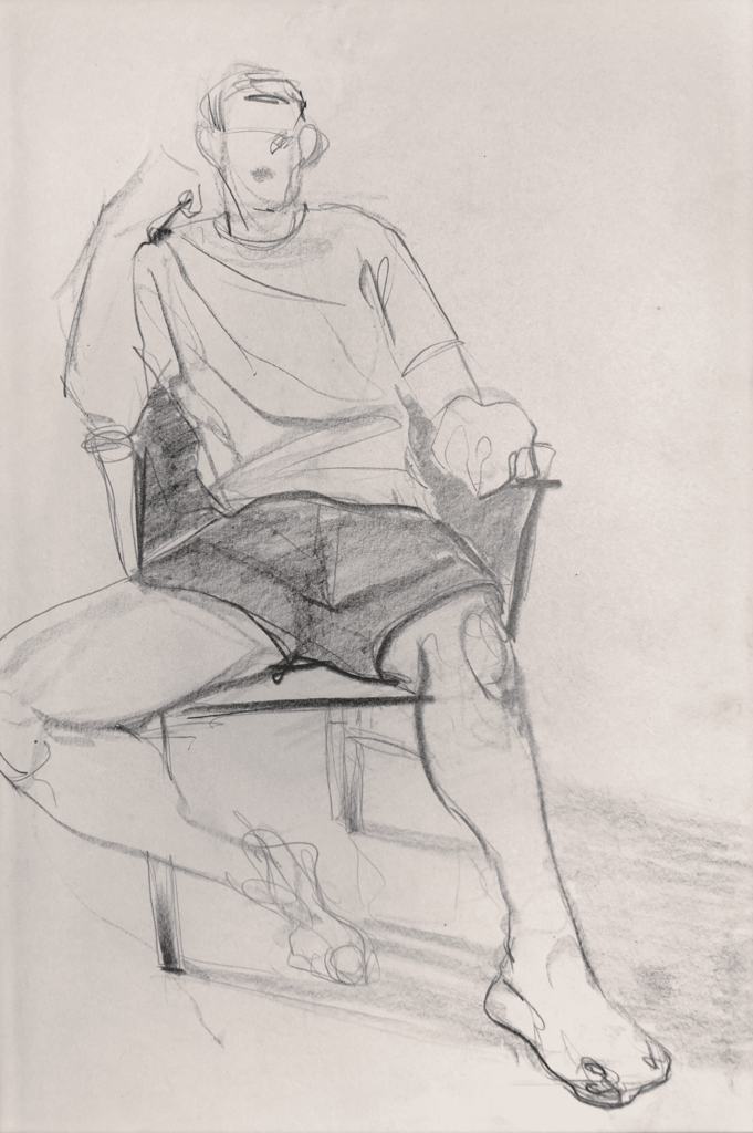 A guy sitting in a chair (original)