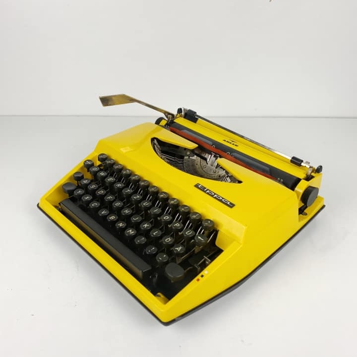 Друкарська машинка вінтаж жовта
