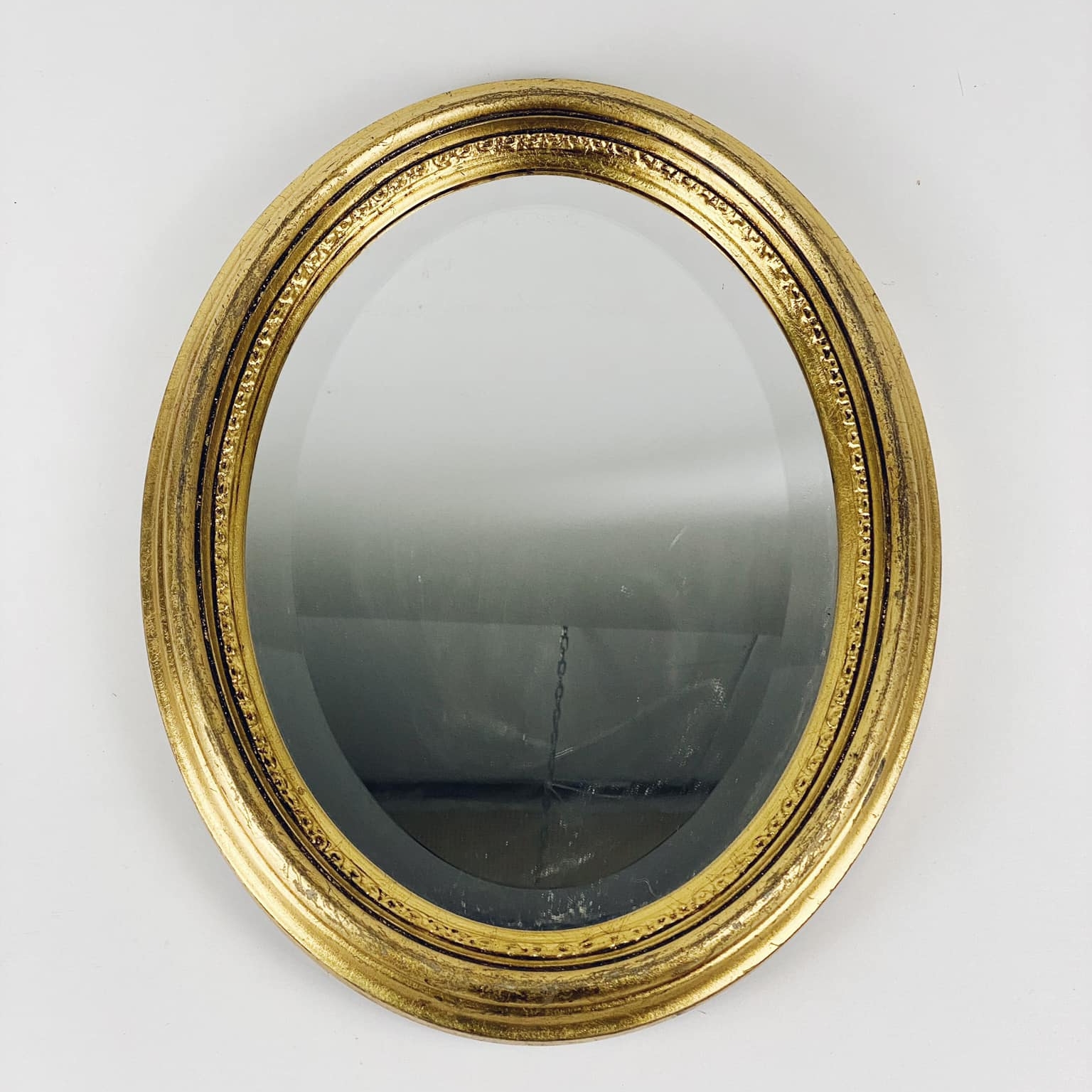 Дзеркло настінне овальне в золотій рамі MR-003