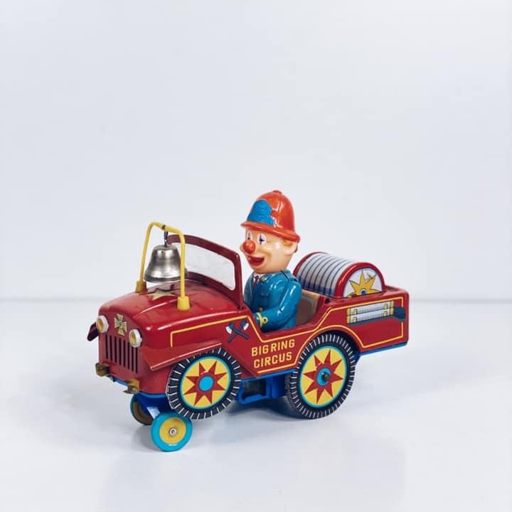 Іграшка вінтаж Циркова пожежна машина з клоуном