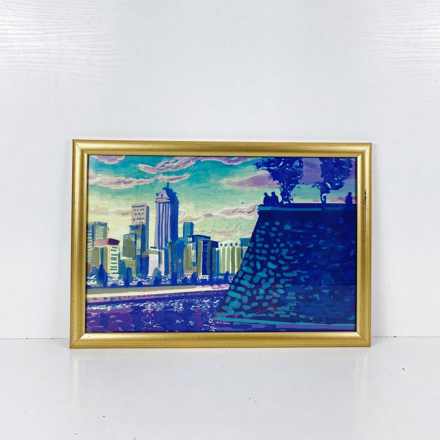 Пейзаж з хмарочосами синій в золотій рамці AR-900