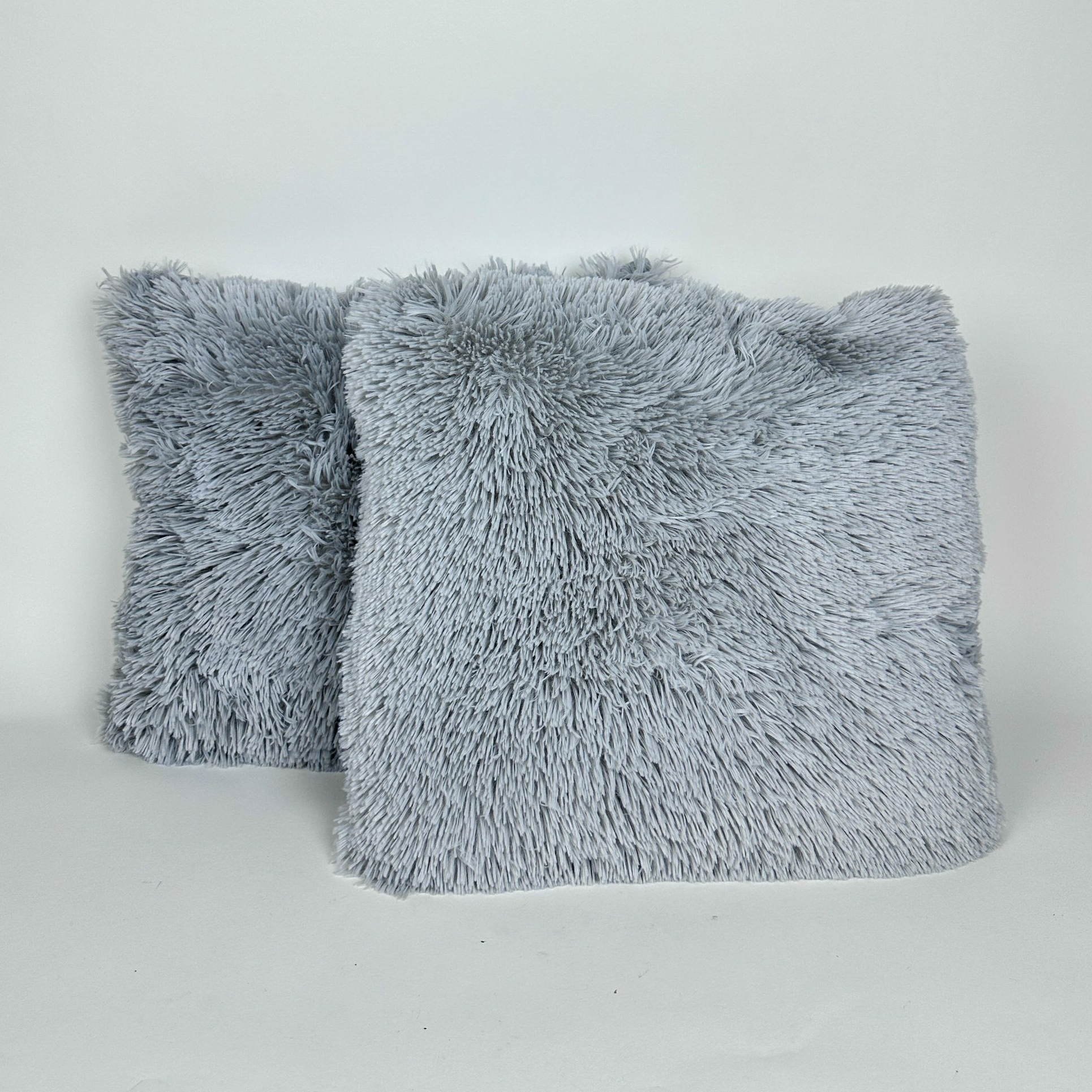 Подушка декоративна сіра штучне хутро PW-489