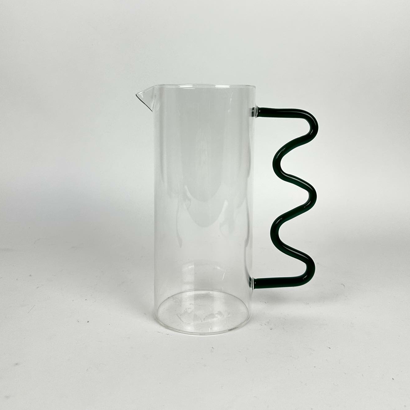 Глечик з фігурною ручкою прозоре/т-зелене скло JU-116