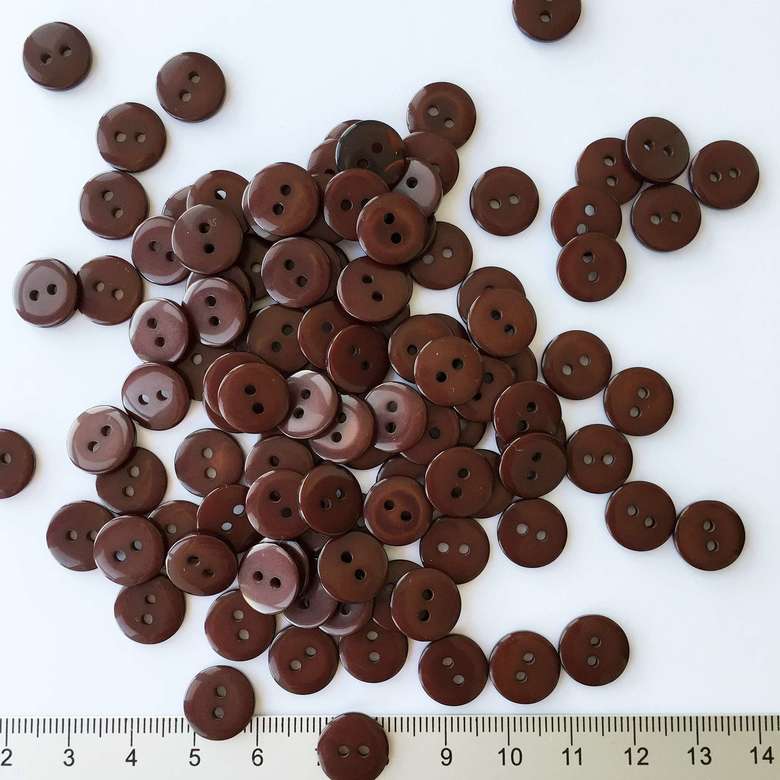 86.01.14.- Гудзики пластикові, 11 мм - Коричневий - (10/100 шт.)