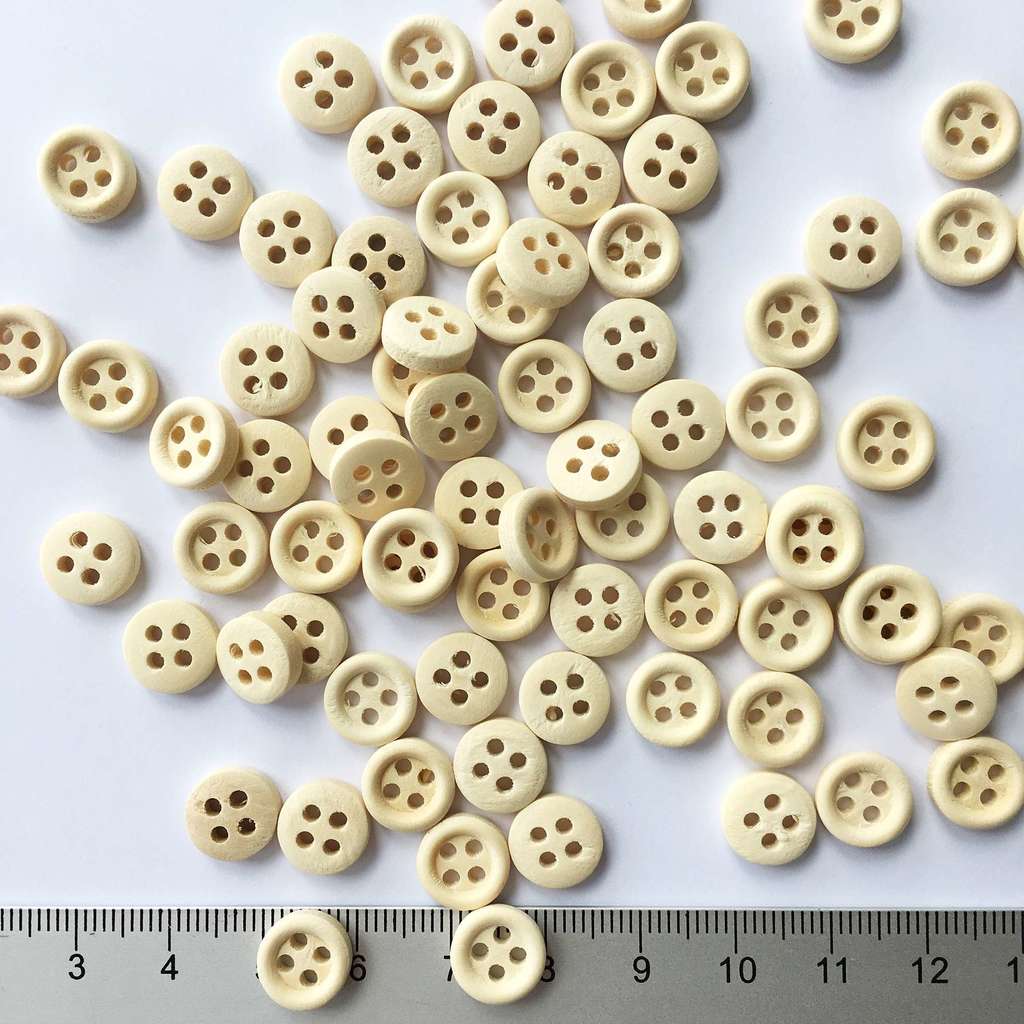 85.3.1. Гудзики дерев'яні, 10 мм - (10/100 шт.)