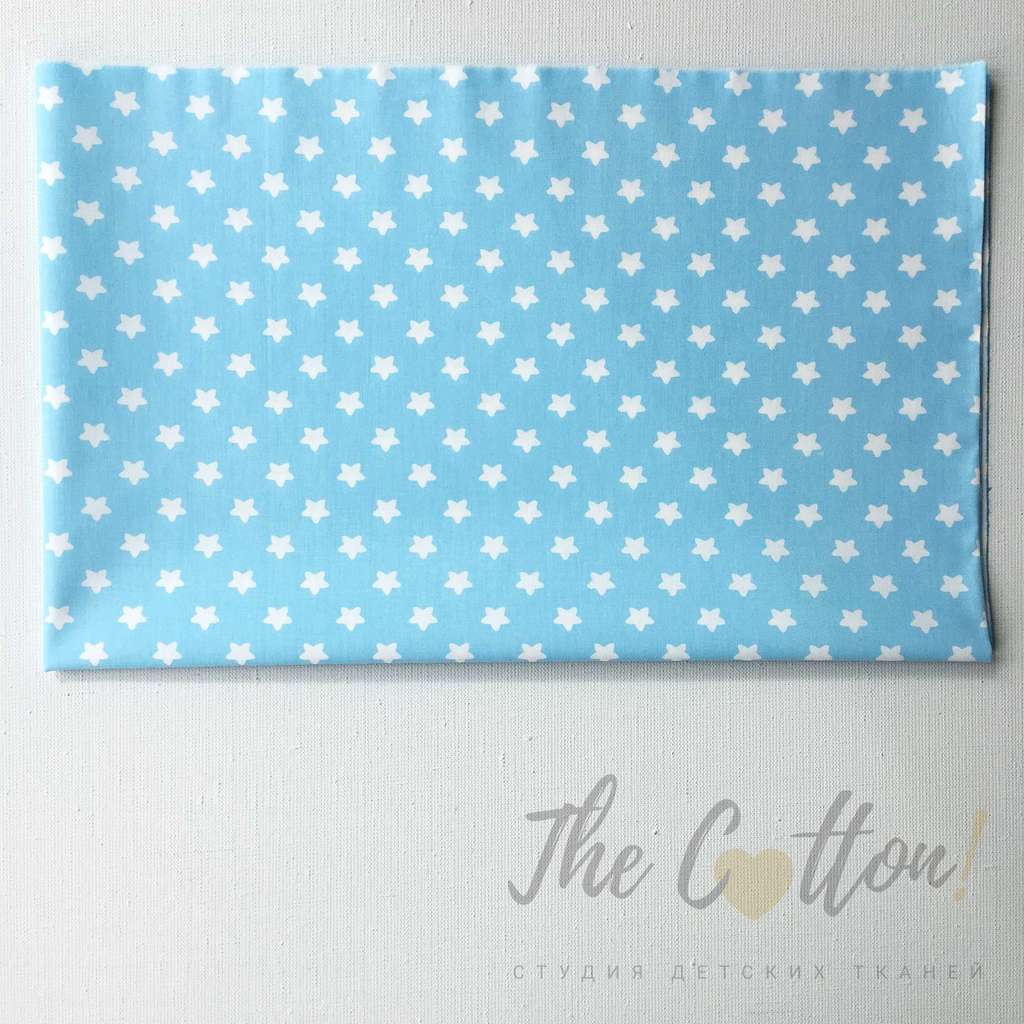 14.152.2. Відрізи бавовни – Сатин – Зірочки 11 мм, білі на блакитному