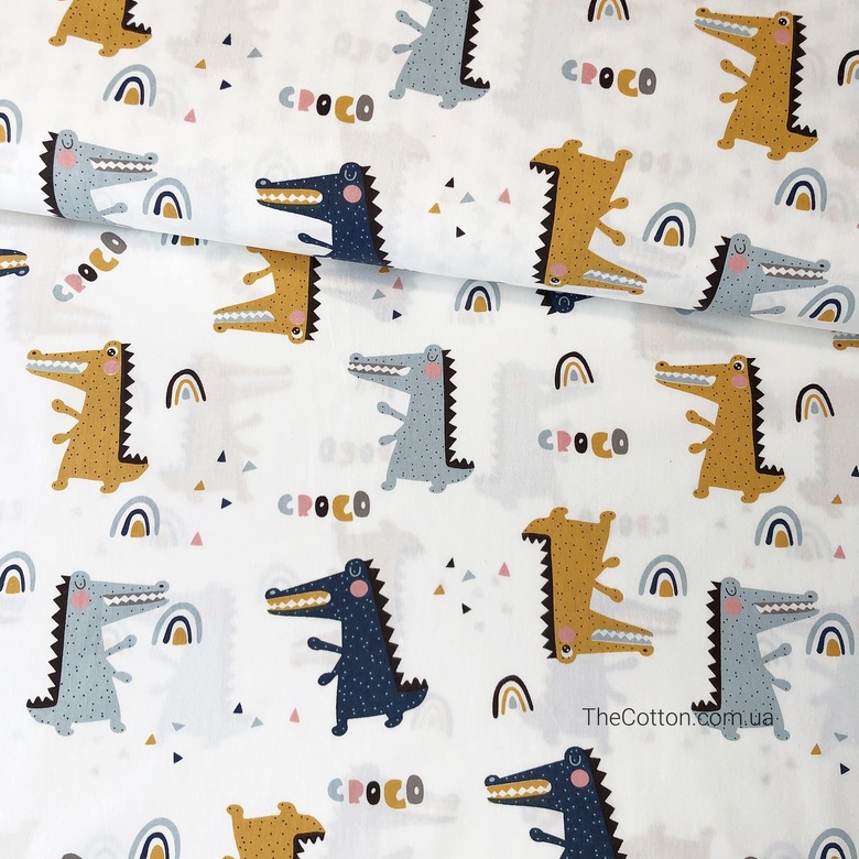 14.335. Відрізи бавовни - Сатин - Крокодильчики сині, сірі та гірчичні на білому.