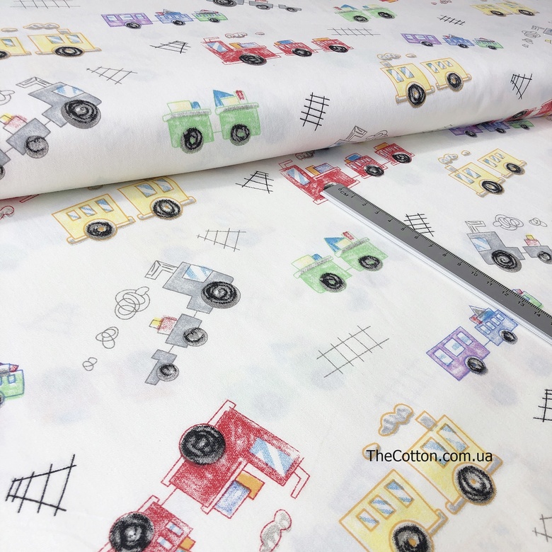 14.346. Бавовна Сатин - Паровозики кольорові на молочному
