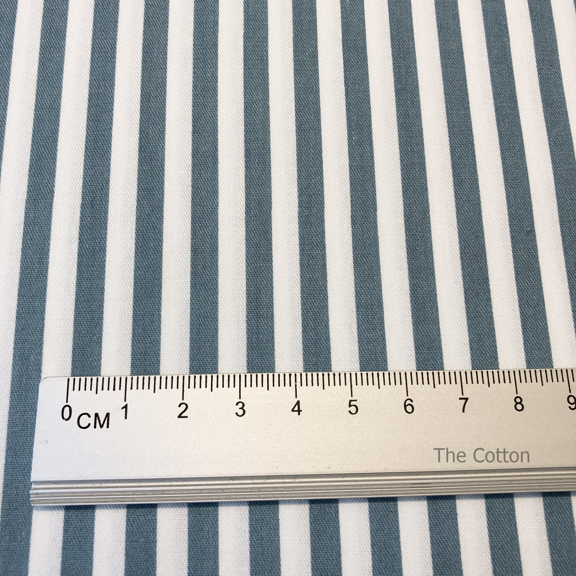 14.128.1. Відрізи бавовни - Сатин - Смуга середня, 5 мм, морська хвиля