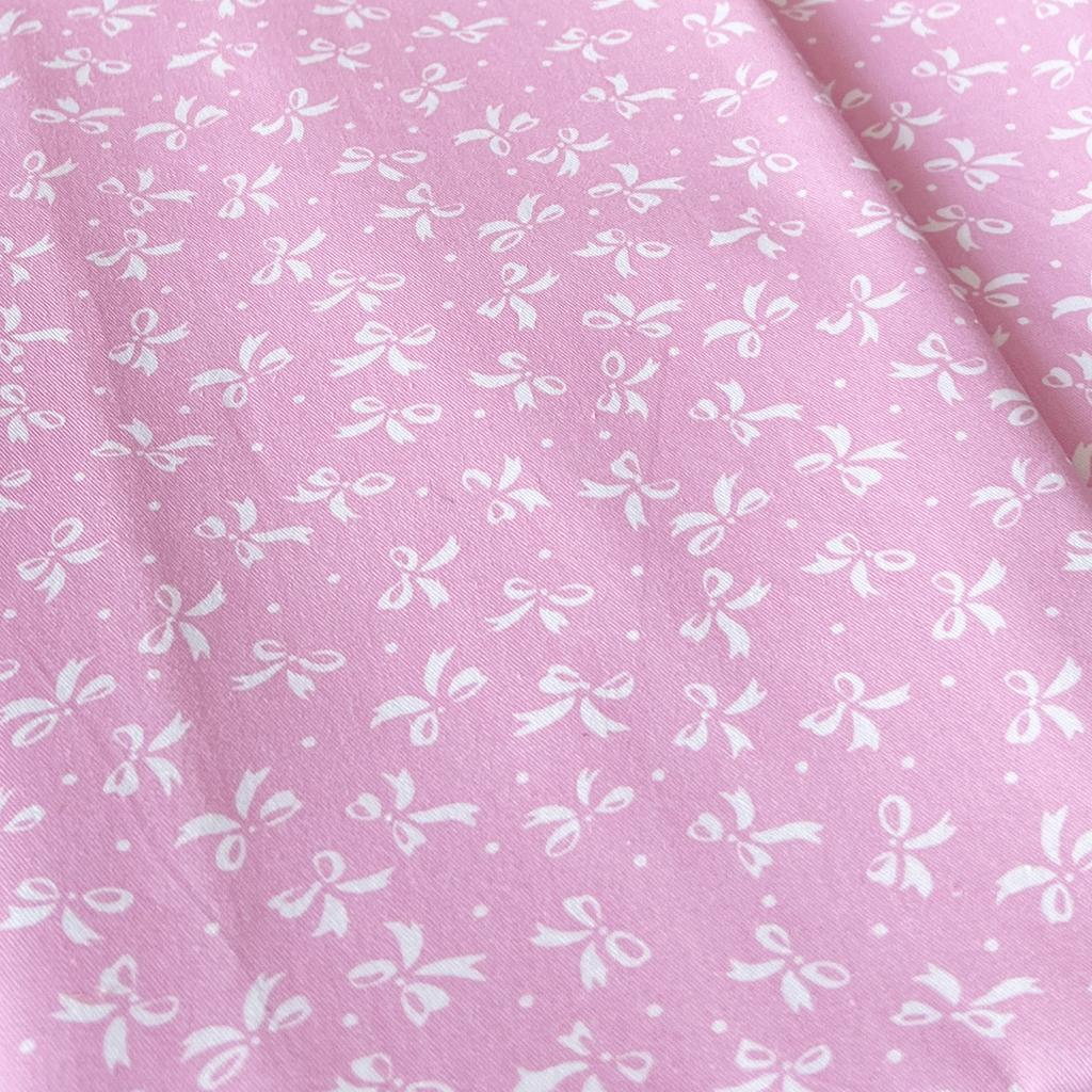 14.183.1. Бавовна Сатин - Бантики білі на рожевому