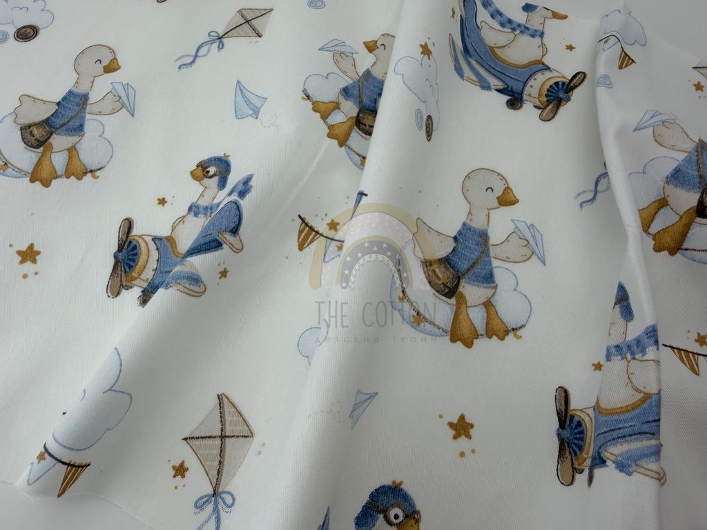 Бавовна Сатин - Принт дитячий гусята пілоти на молочному SP 1218