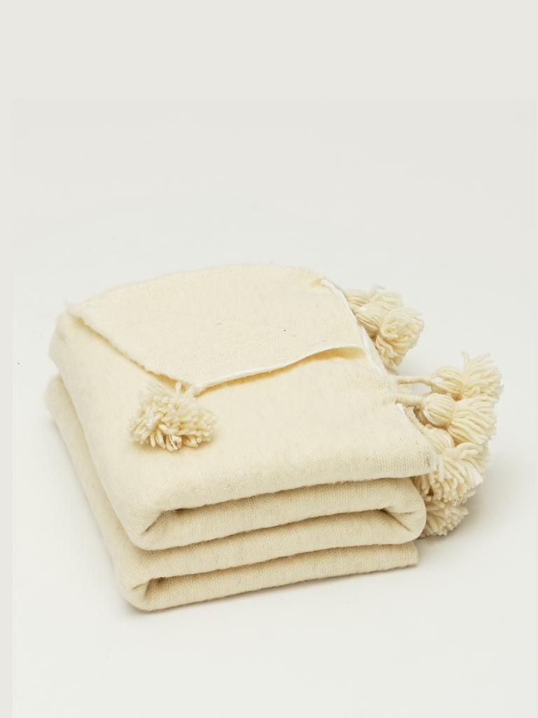 Марроканский плед из шерсти с помпонами | Интернет-магазин Nomadchic.ru