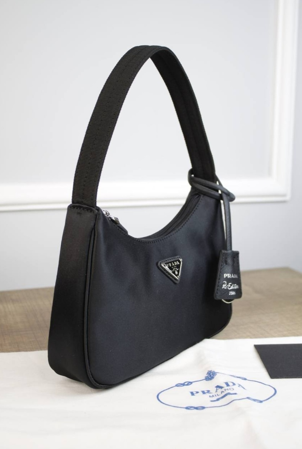 Сумки маленькие > Сумка Prada Re-Edition 2000 Nylon mini bag 51339 купить в интернет-магазине