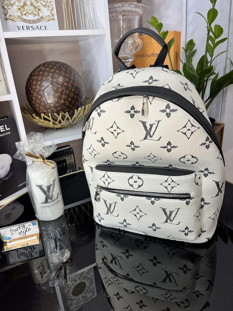 Рюкзак большой текстиль молочного цвета Louis Vuitton 666665151