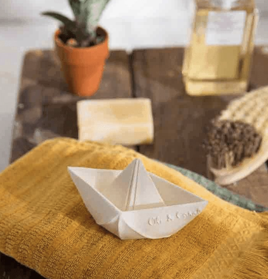 Origami boat best sale bath toy