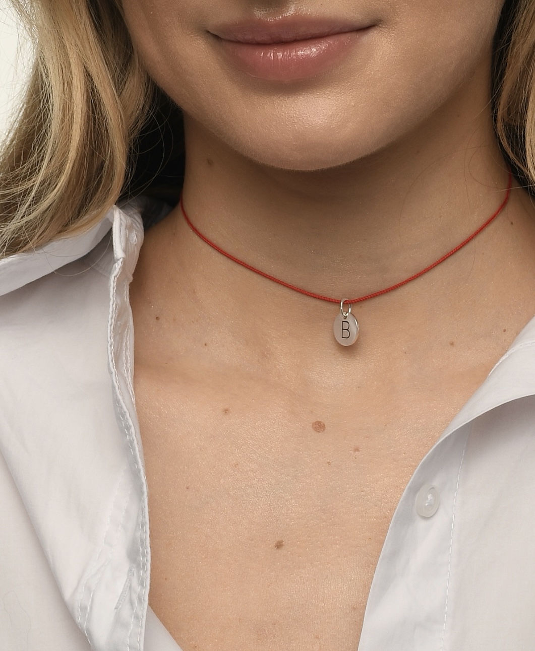 Монетка з ініціалом