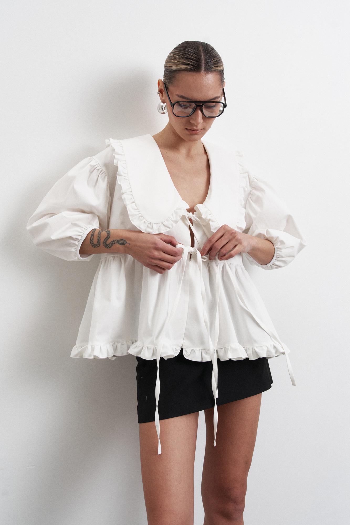 Блуза з рюшами