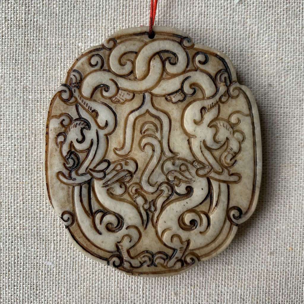 Кам'яний предмет Два дракони