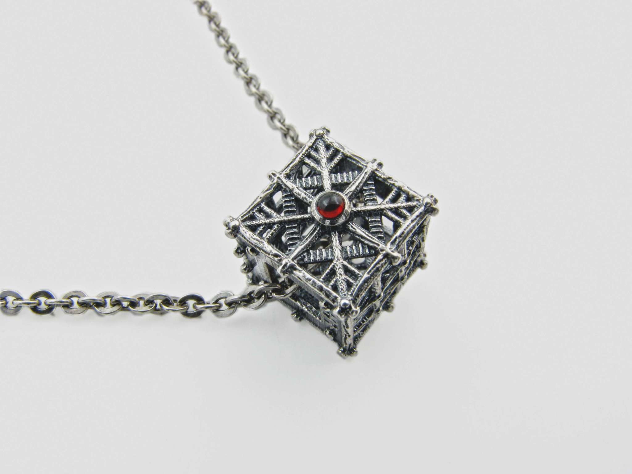 Witch house - pendant with garnet