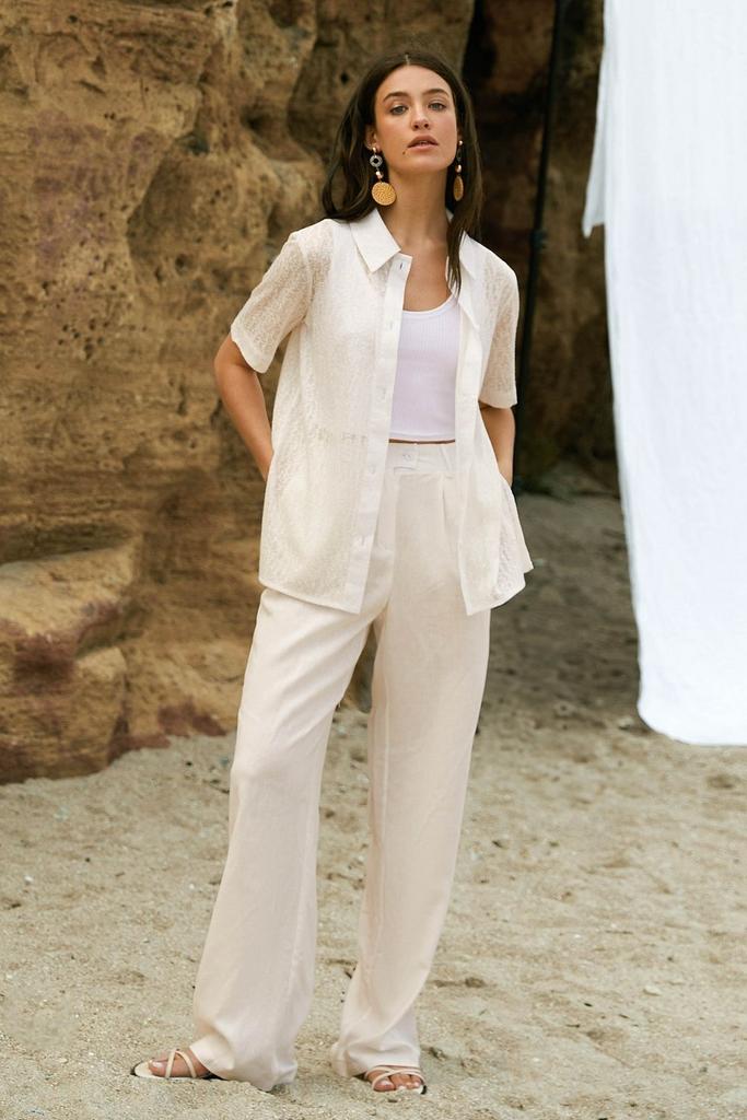 Брюки молочні лляні