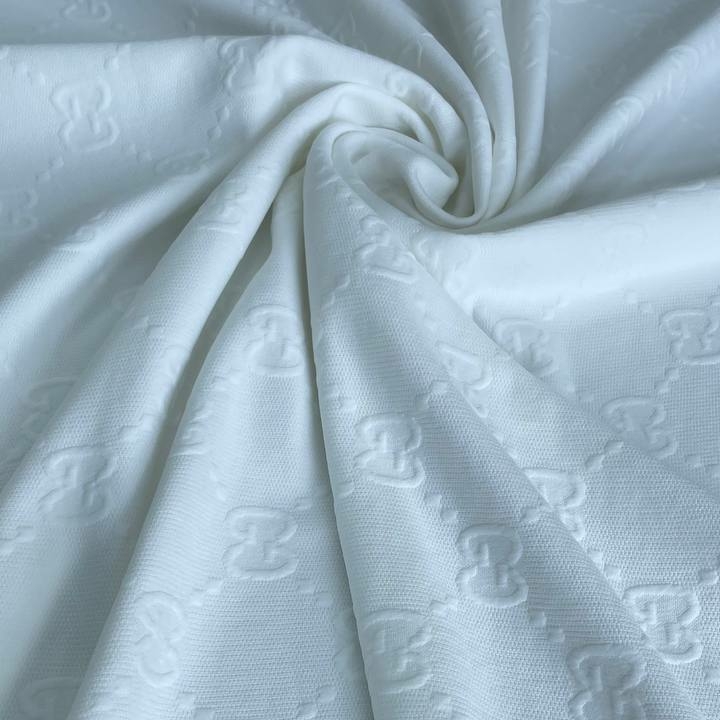 Трикотажное полотно с жакардовым лого Gu.cci белого цвета
