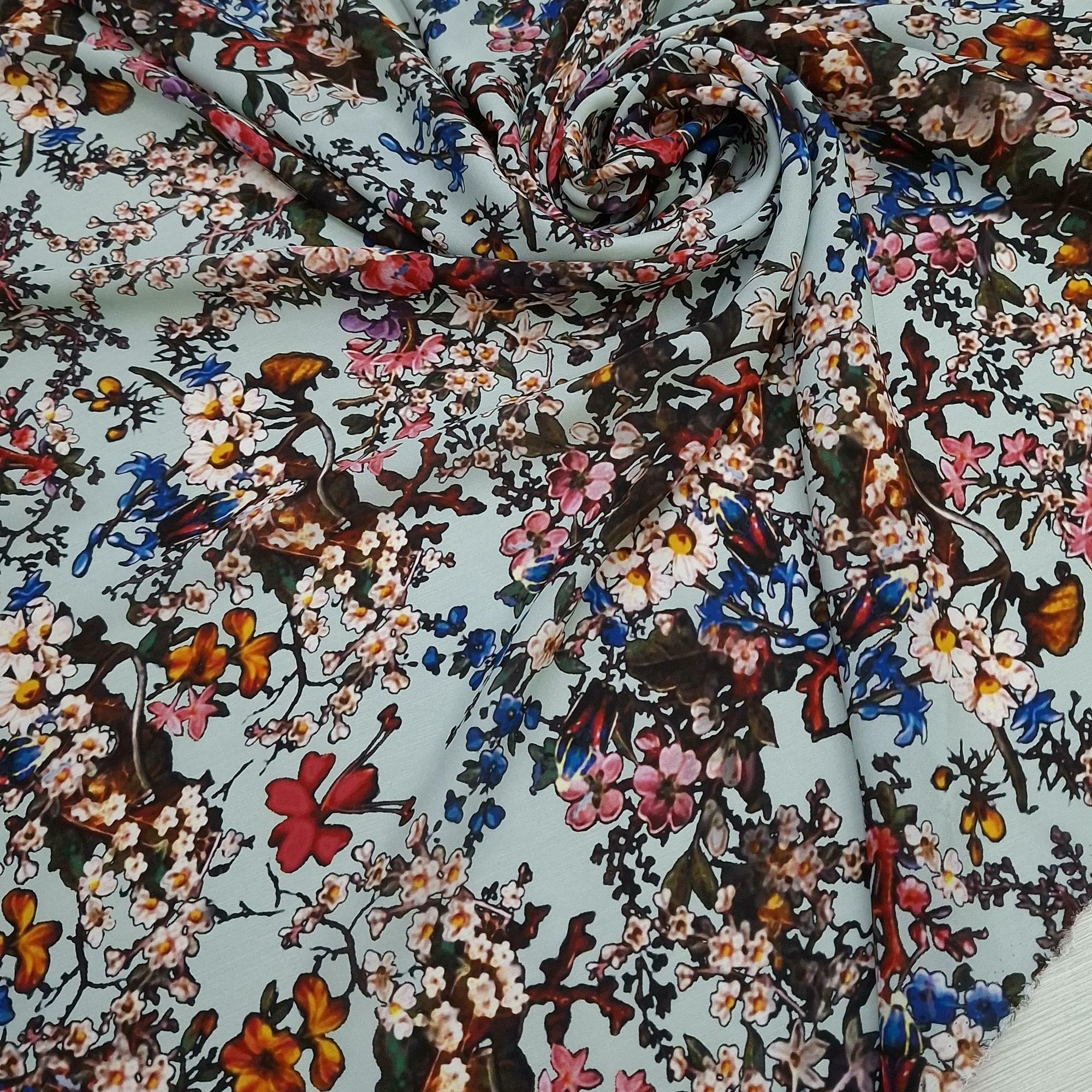 Шелковый крепдешин Elie S@ab фон голубой, принт цветочный