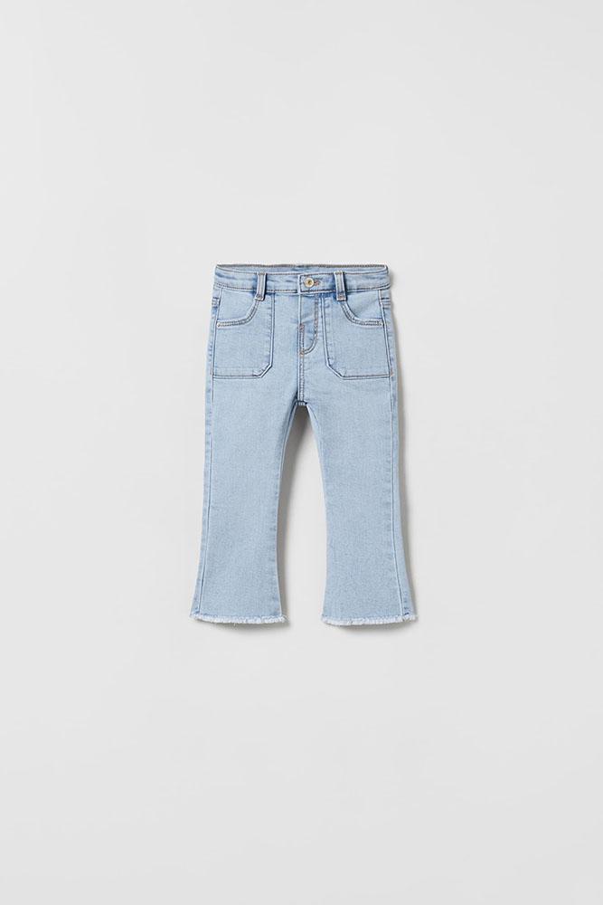 Розкльошені джинси з бахромою Блакитні