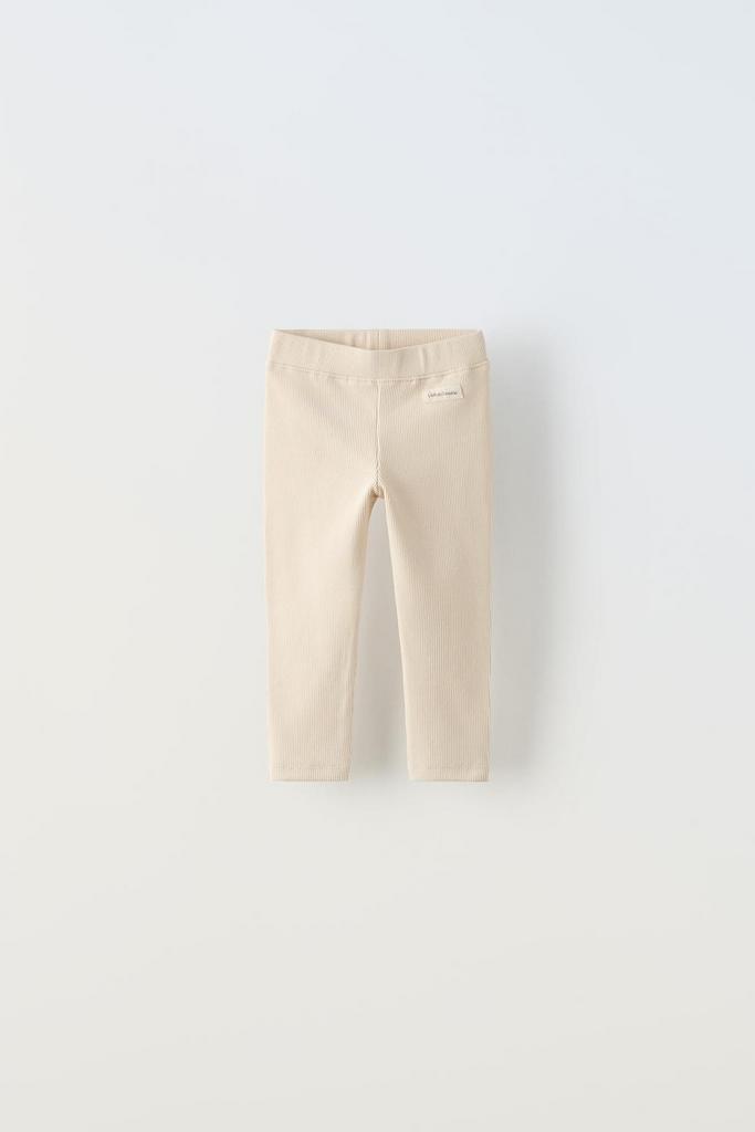 Легінси в рубчик із лейблом