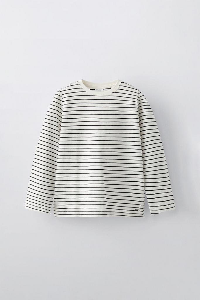 Смугастий реглан з аплікацією