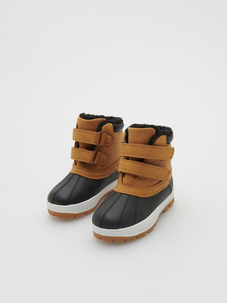 Водовідштовхувальні утеплені високі черевики