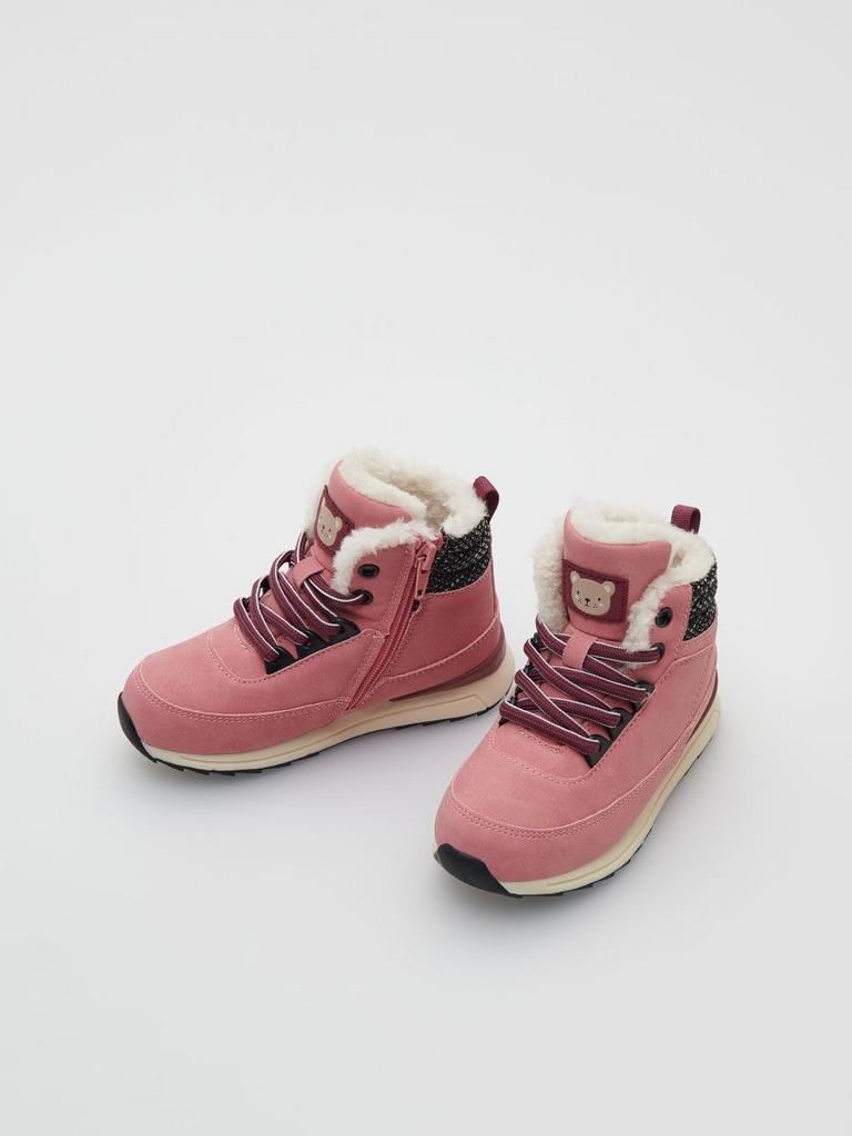 Утеплені високі черевики