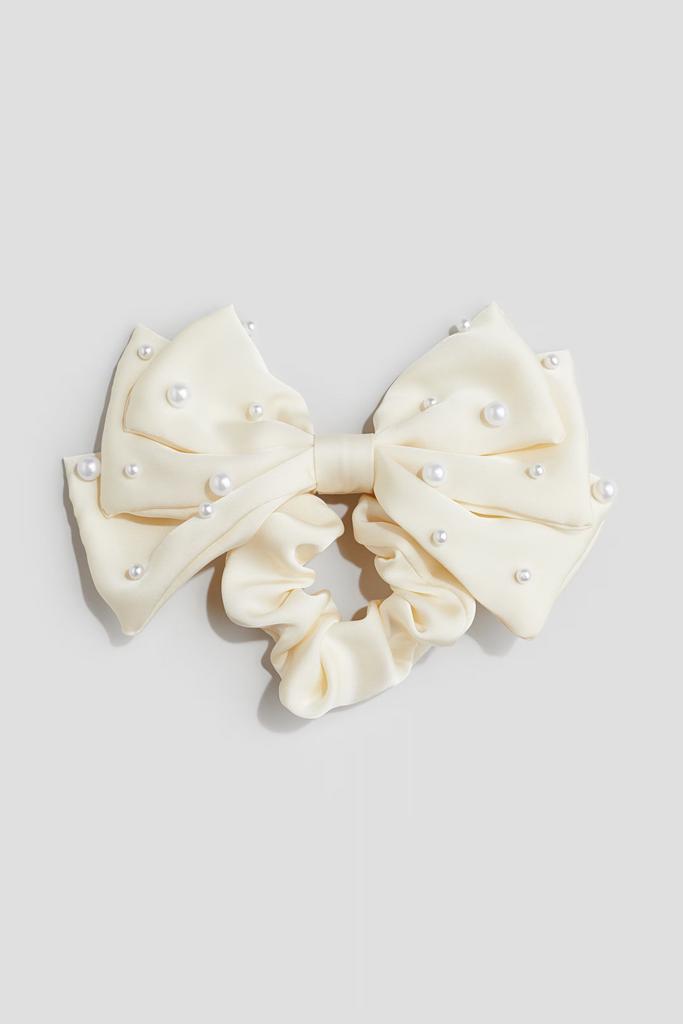 Резинка для волосся з бантом