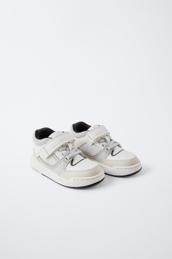 Високі кросівки зі вставками