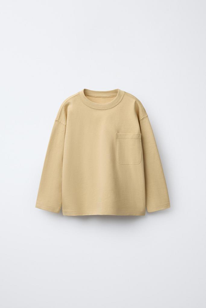 Однотонний реглан з кишенею