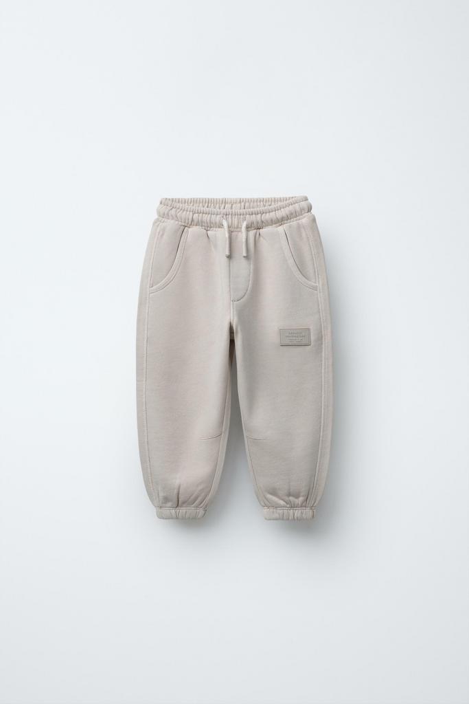 Штани-джогери з етикеткою Бежеві