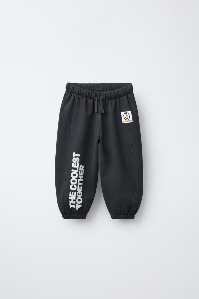 Штани-джогери з флоковим текстом