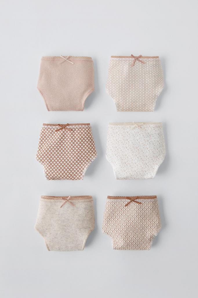 Набір із шести пар трусиків з еластичним поясом та аплікацією з бантика спереду