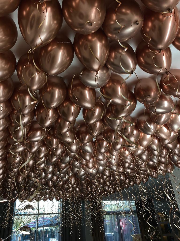 Rose Gold Chrome ceiling helium balloons
