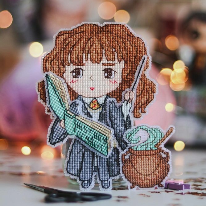 Герміона з котиком та казанок зілля