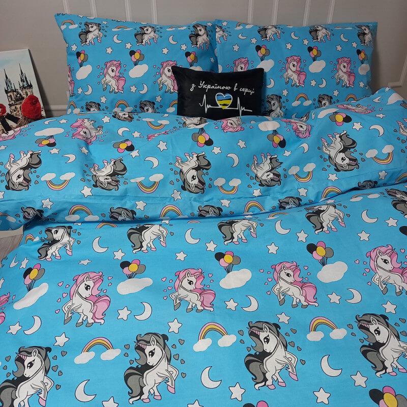 блакитна дитяча постільна білизна бязь з єдиноріжками фото 1