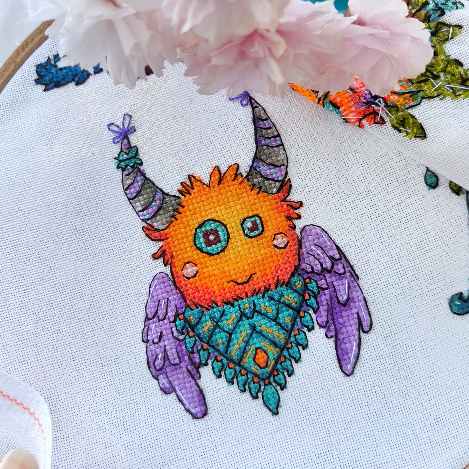 Funny monster with wings - cross stitch pattern