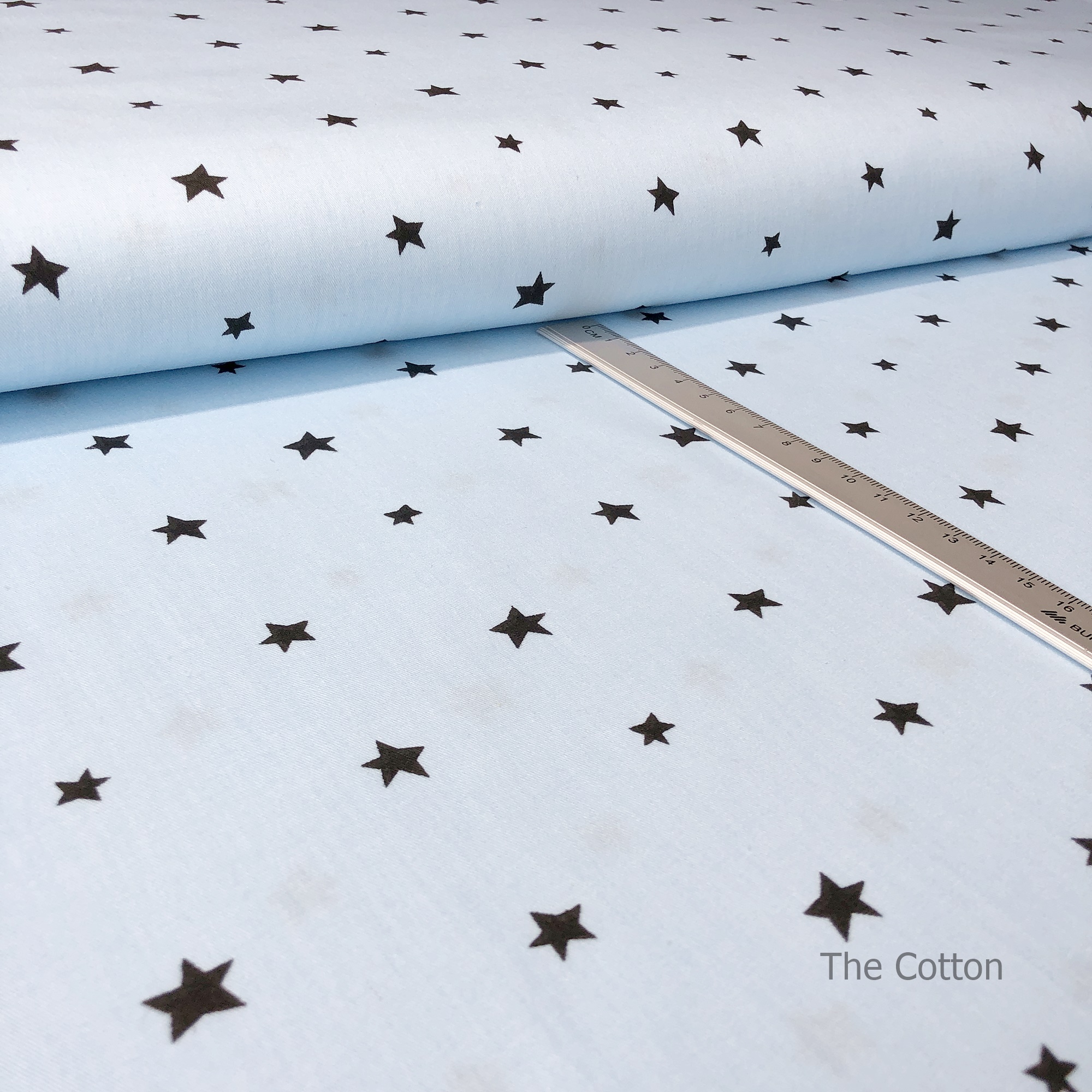 14.158.5. Бавовна Сатин - Зірочки чорні на блакитному