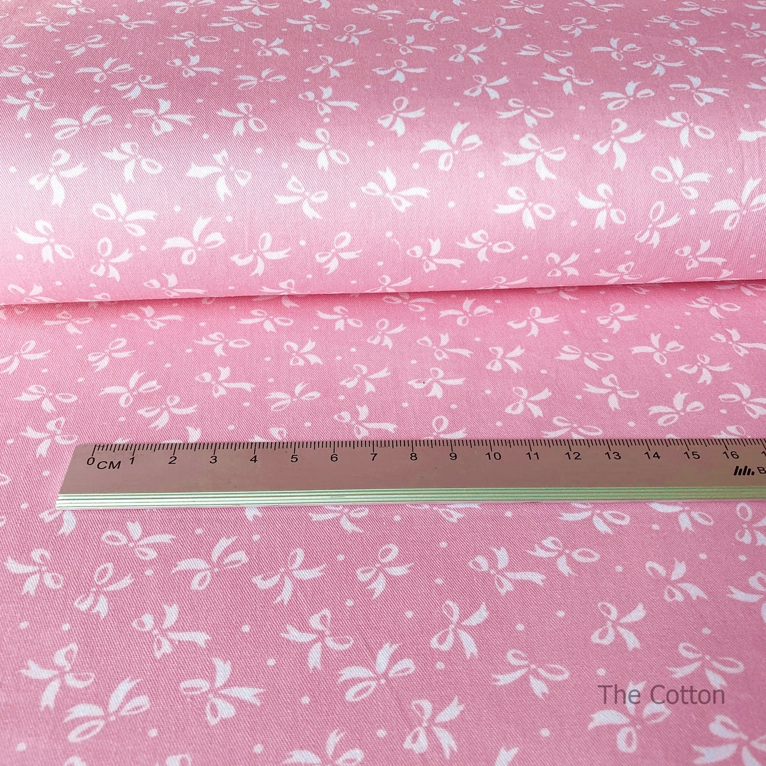 14.183.1. Бавовна Сатин - Бантики білі на рожевому