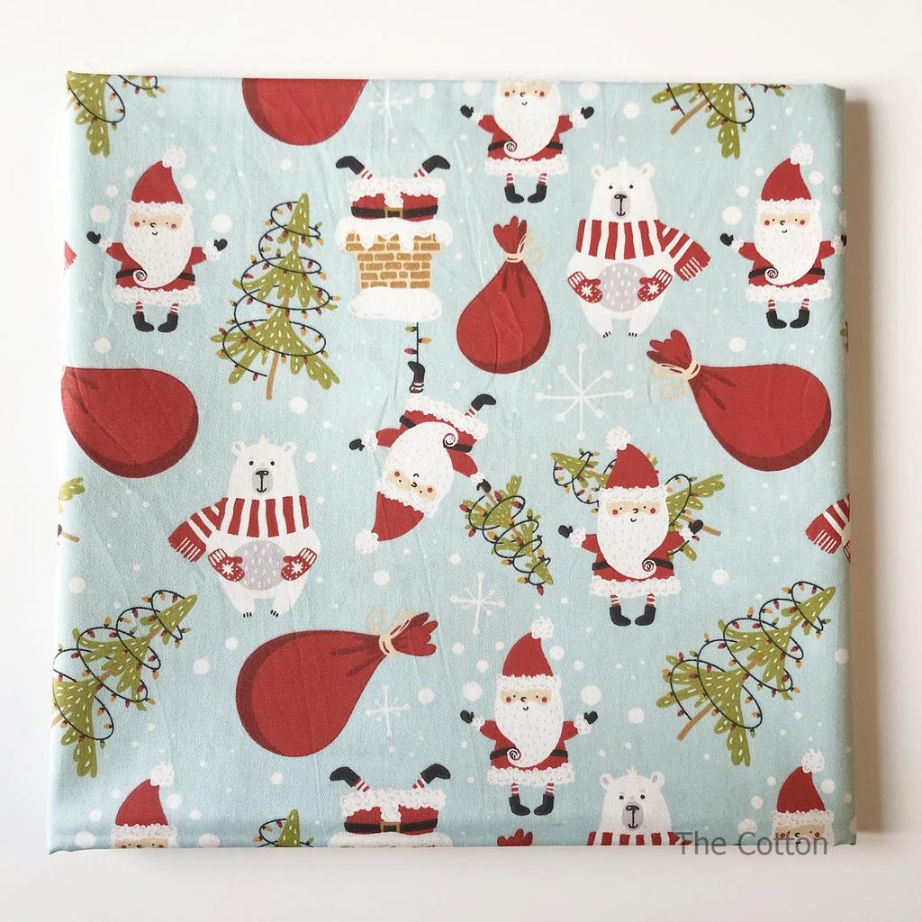 14.506.14. Лоскути - Сатин - Білий ведмедик і Санта на світло-блакитному