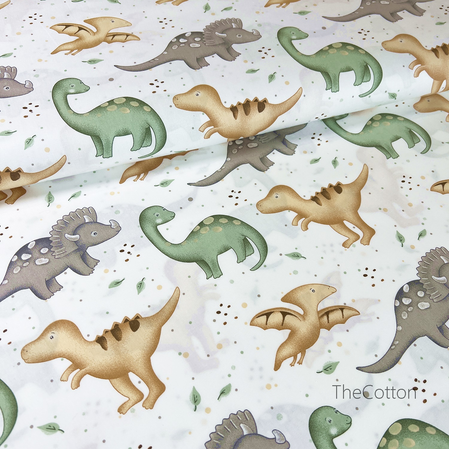 14.384.4. Бавовна Сатин - Динозаври зелені, бежеві та сірі на молочному