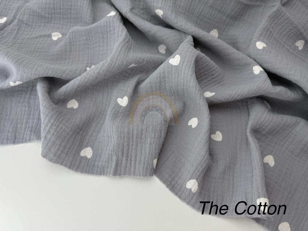 Муслін - Сердечки  середні білі  на сірому
