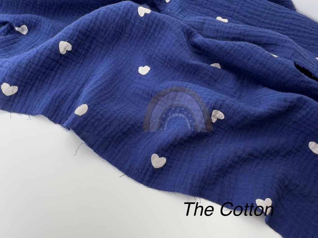 Муслін - Сердечки білі середні  на синьому