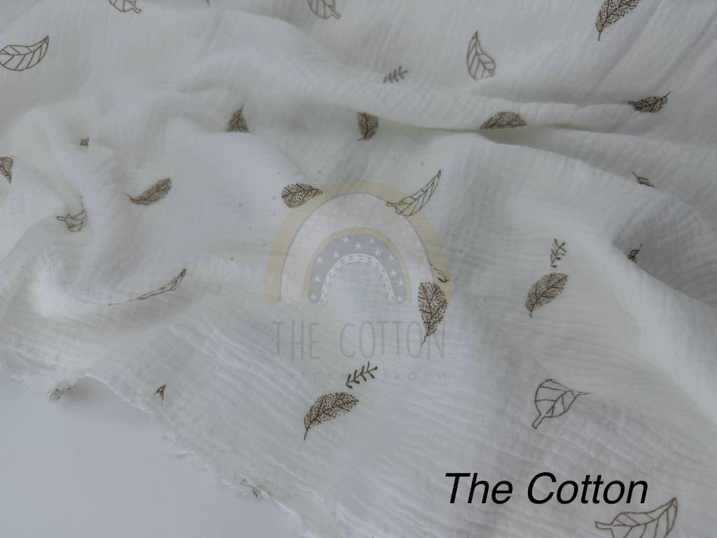 Муслін - Листочки пір'ячка коричневі  на молочному