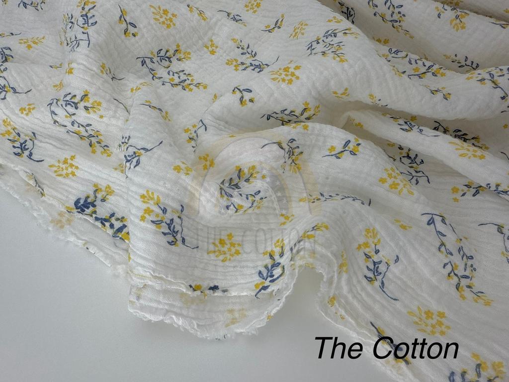 Муслін - Гілочки сині з жовтими квітами  на молочному